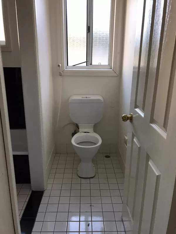 Exist Photo of detached toilet from bathroom 